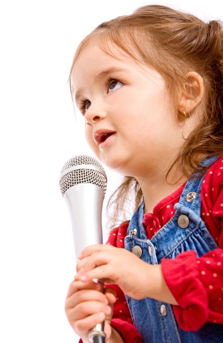 child singing with a microphone isolated over a white background