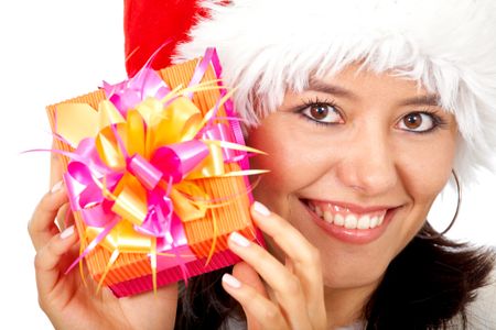 female santa holding a christmas gift smiling