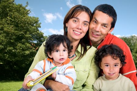 beautiful family outdoors - clipping path included to remove the background with ease