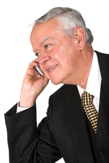 senior business man on a cell phone over white