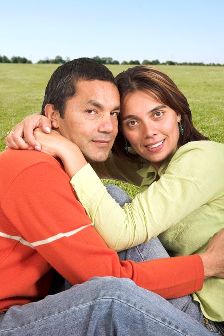 casual couple outdoors in a park