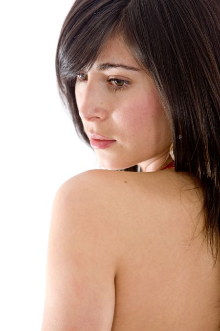 Casual pensive woman isolated over a white background