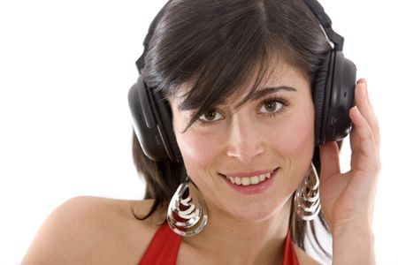 Girl listening to music looking happy - isolated over a white background