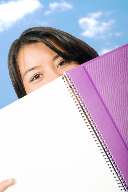 beautiful student with notebook at university