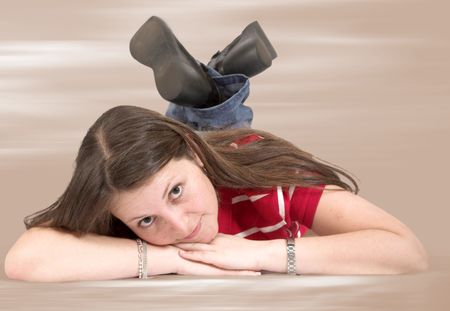 cute-teen-floor-brown-background-1844429 cute teen on the floor over a brown background