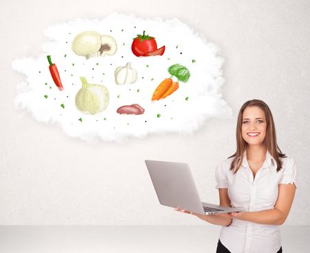 Young girl presenting nutritional cloud with vegetables concept