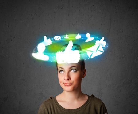 Teenager with cloud social icons around her head 