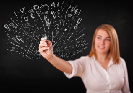 Young girl drawing and skteching abstract lines and symbols 