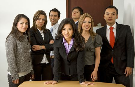 Business office team work - all young and successful businessmen and businesswomen