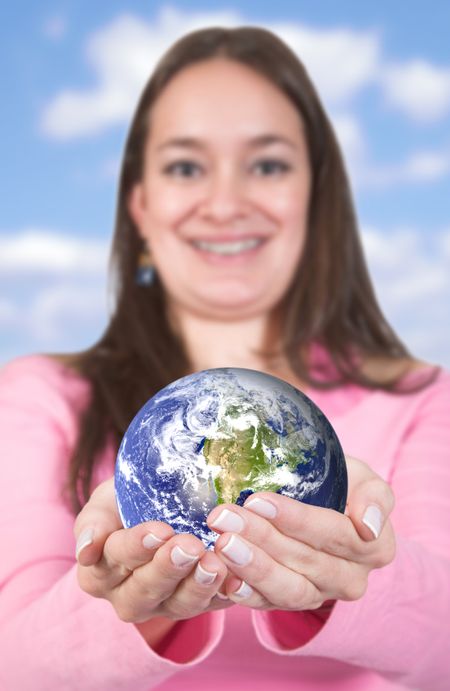 girl holding globe - focus on globe globe photo taken from www.nasa.gov