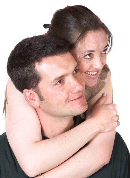 beautiful happy couple looking away over white