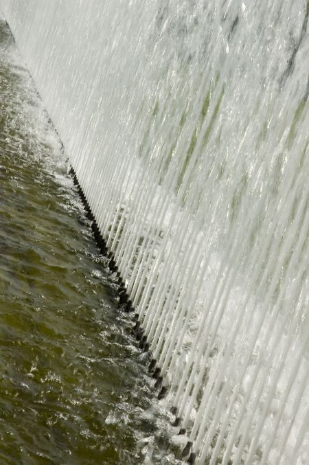 Wall of water from row of fountain jets