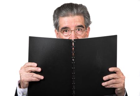 business man with a book over a white background