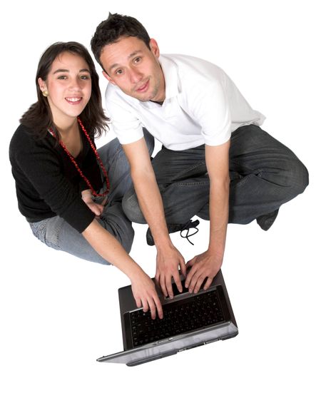 casual couple on laptop over white