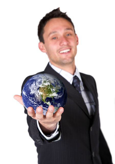 I've got the power - business man holding globe over white