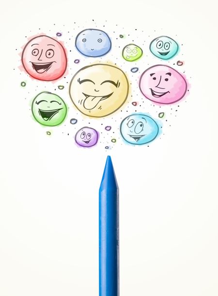 Coloured smiley face bubbles coming out of crayon