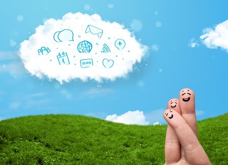 Happy cheerful smiley fingers looking at cloud with blue social icons and smybols