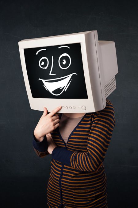 Girl with a monitor screen face and a happy cartoon face