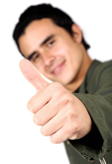 casual guy going - thumbs up - with his hand, focus is on hand