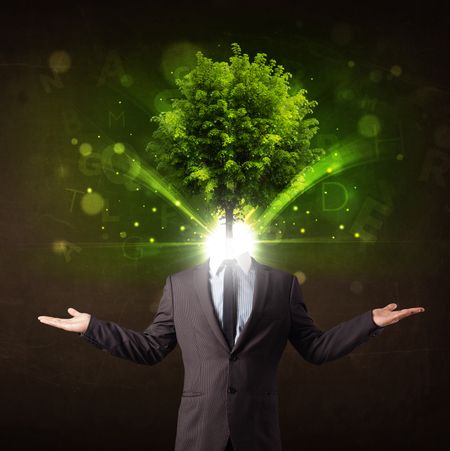 Man with green tree head concept on brown background