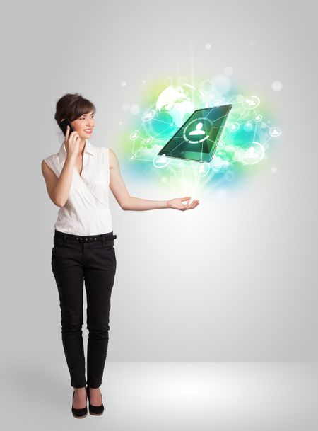 business-girl-showing-modern-green-tablet-194764946 Business girl showing modern green tablet technology concept