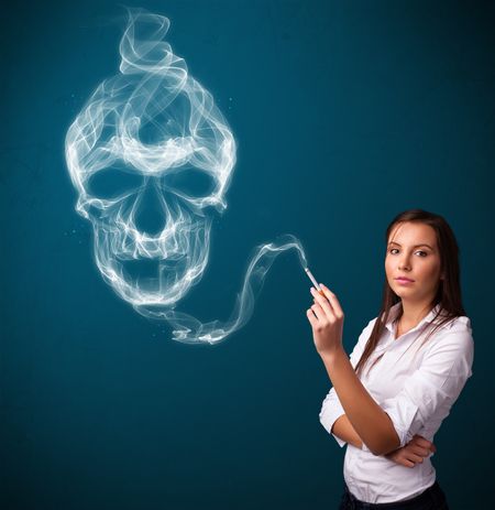 Pretty young woman smoking dangerous cigarette with toxic skull smoke 