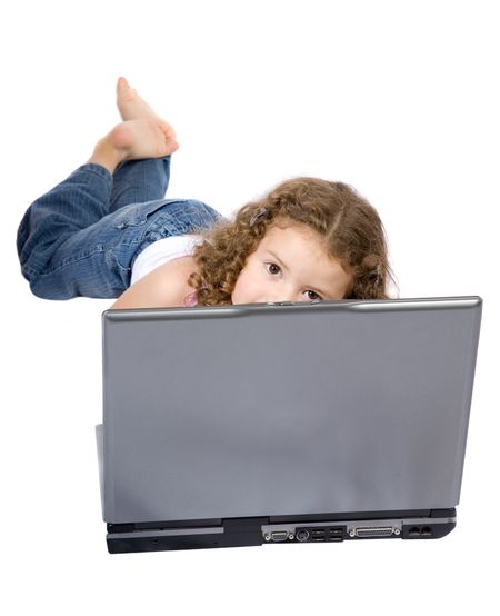 beautiful little girl on a laptop over white