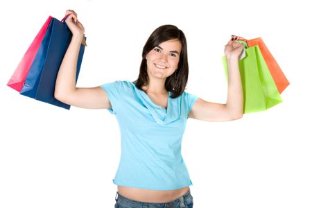 beautiful woman with shopping bags over white