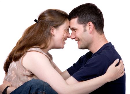 couple with faces together over white