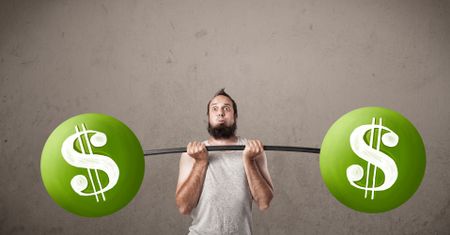 Funny skinny guy lifting green dollar sign weights