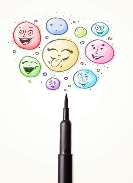 Coloured smiley face bubbles coming out of felt pen