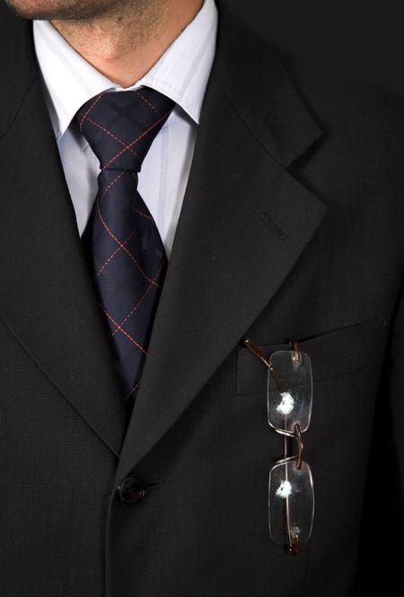 business suit over a black background