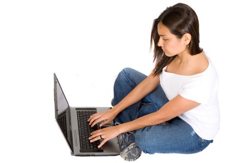 beautiful girl using a laptop over a white background
