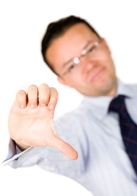 business man with his thumb pointing down representing a bad deal - over white