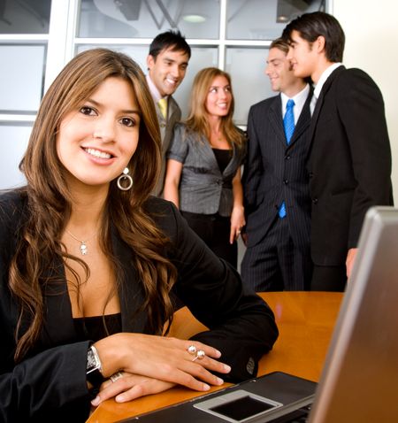 business woman and her team in an office