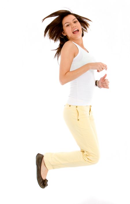 girl jumping full of joy over a white background