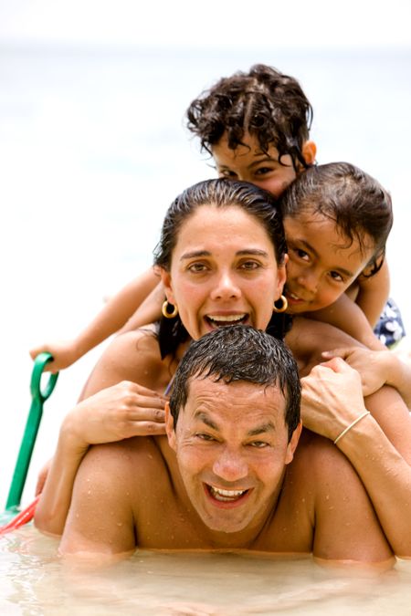 happy family having fun on holidays - togetherness concept