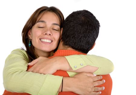 couple in love hugging over a white background