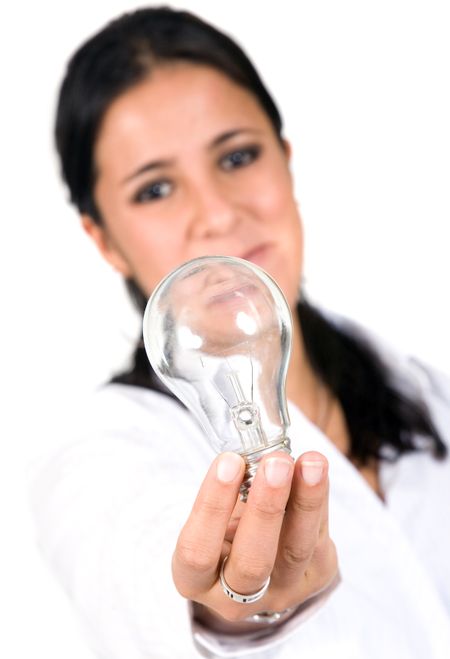 business woman holding a lightbulb on her hand over a white background