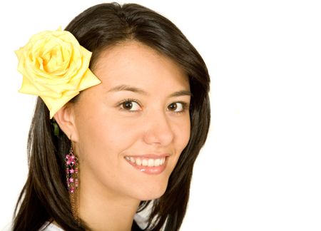 beautiful girl portrait with a flower on her head over a white background