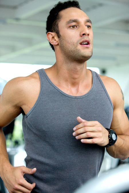 man at the gym doing exercise on the treadmill