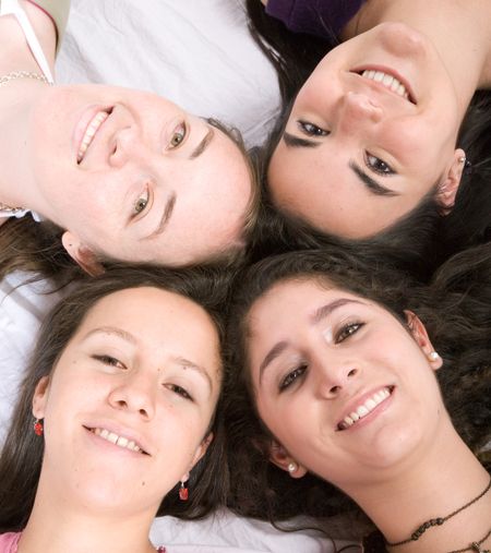 girls-floor-white-background-2033224 girls on the floor over a white background