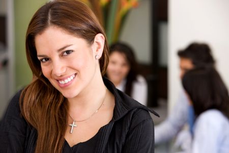 business woman in an office leading a team