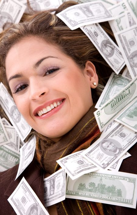 business woman millionaire with money around her face