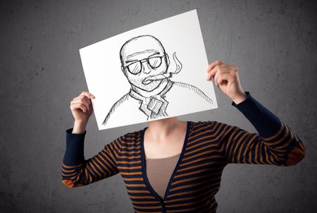 Woman holding a cardboard with a smoking man on it in front of her head