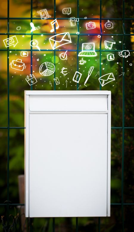Colorful modern icons and symbols bursting out of a mailbox