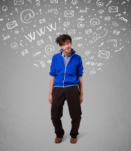 Casual young man with abstract white media icon doodles on gradient background