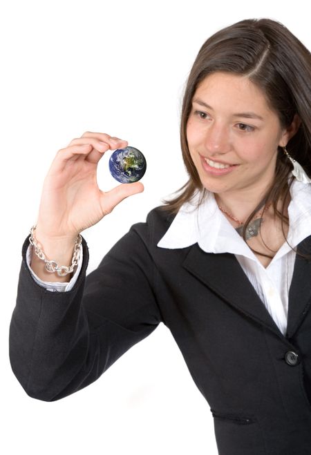 business woman holding a small world over a white background