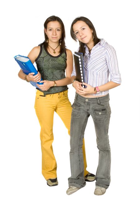 Beautiful twin students over a white background