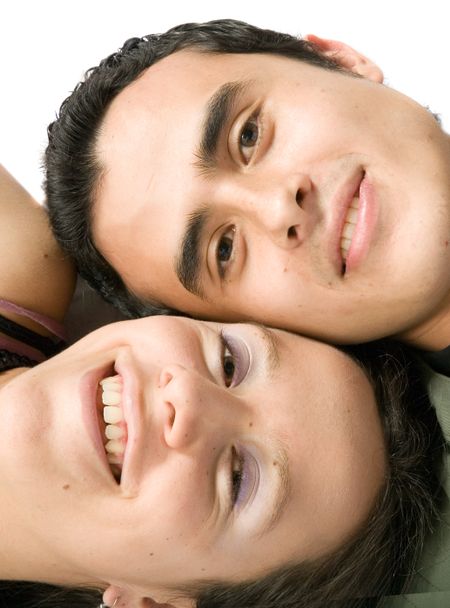 couple close up - heads together on the floor over white